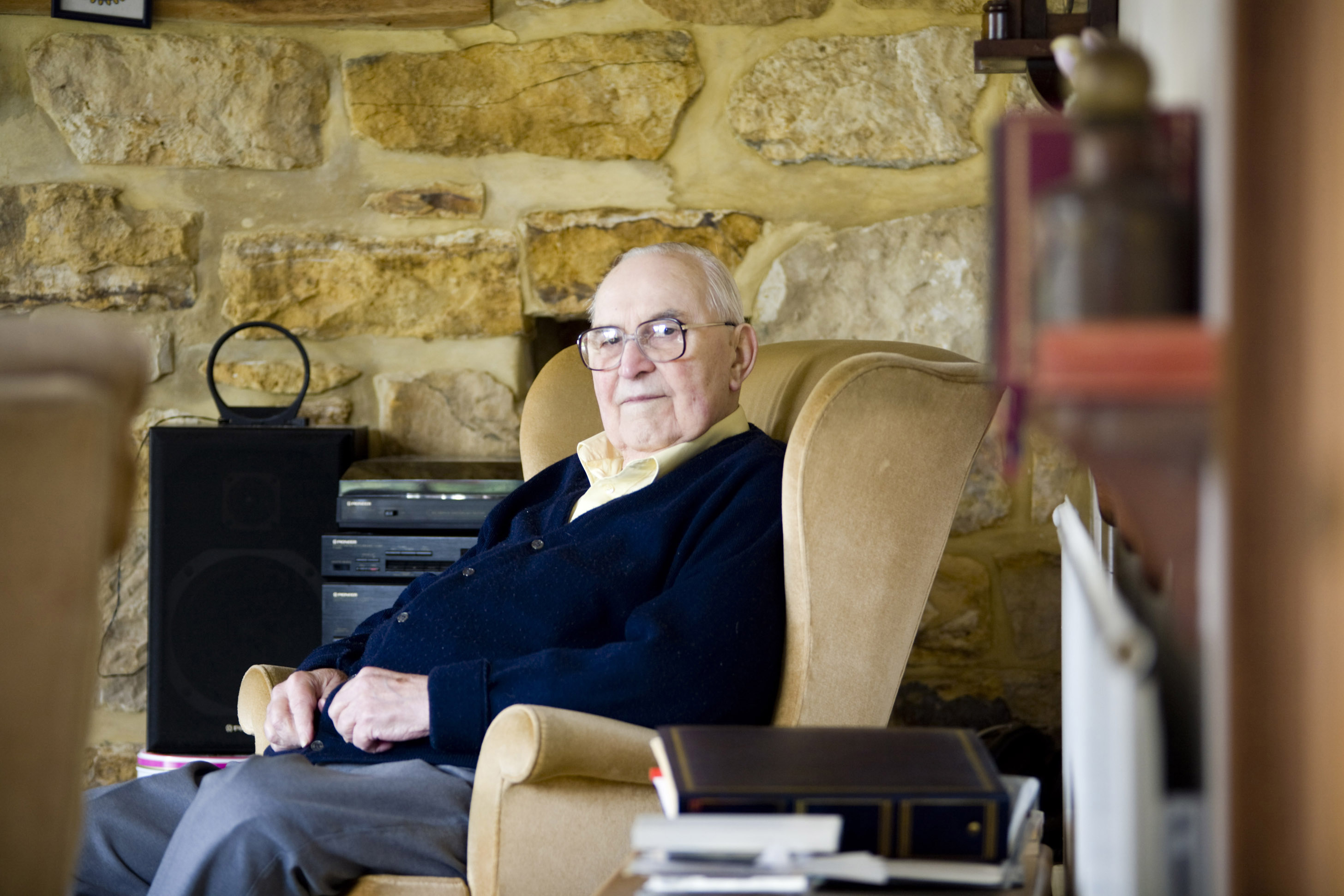Live-in Care, man sitting in his own sitting room