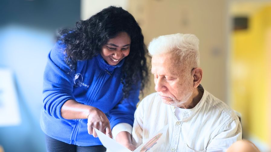 Live-in care professional supporting elderly client at home in Nottinghamshire