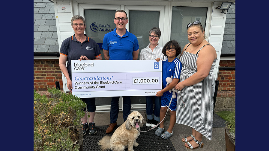East Hampshire charity, Dogs for Autism, is presented with a cheque for £1,000 after winning Bluebird Care Alton, Petersfield & Havant's community grant
