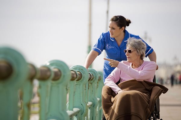 Live-in care, care worker and customer looking at a view
