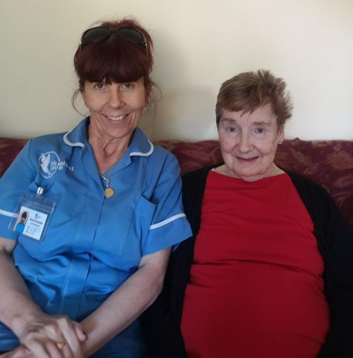 Bluebird Care live-in care assistant with a happy customer