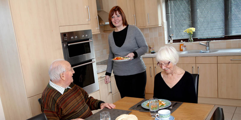 Elderly couple served dinner by live-in carer in Newmarket, Fenland and King's Lynn
